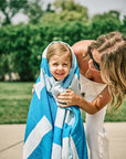 Comb Turkish towel in Marine – drying a child at the poolside after swimming