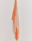 La Luna Turkish towel in Peach – Full-length hanging view showcasing entire pattern and texture