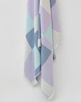 Pale Pluie Indigo X-Large Turkish towel in Mellow Indigo – Close-up hanging towel highlighting weave and softness