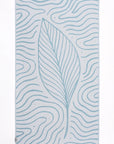 Towel with leaf pattern and fringe on a white background
