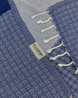 Alcazar Turkish towel in Indigo – Close-up draped towel showing detail and texture