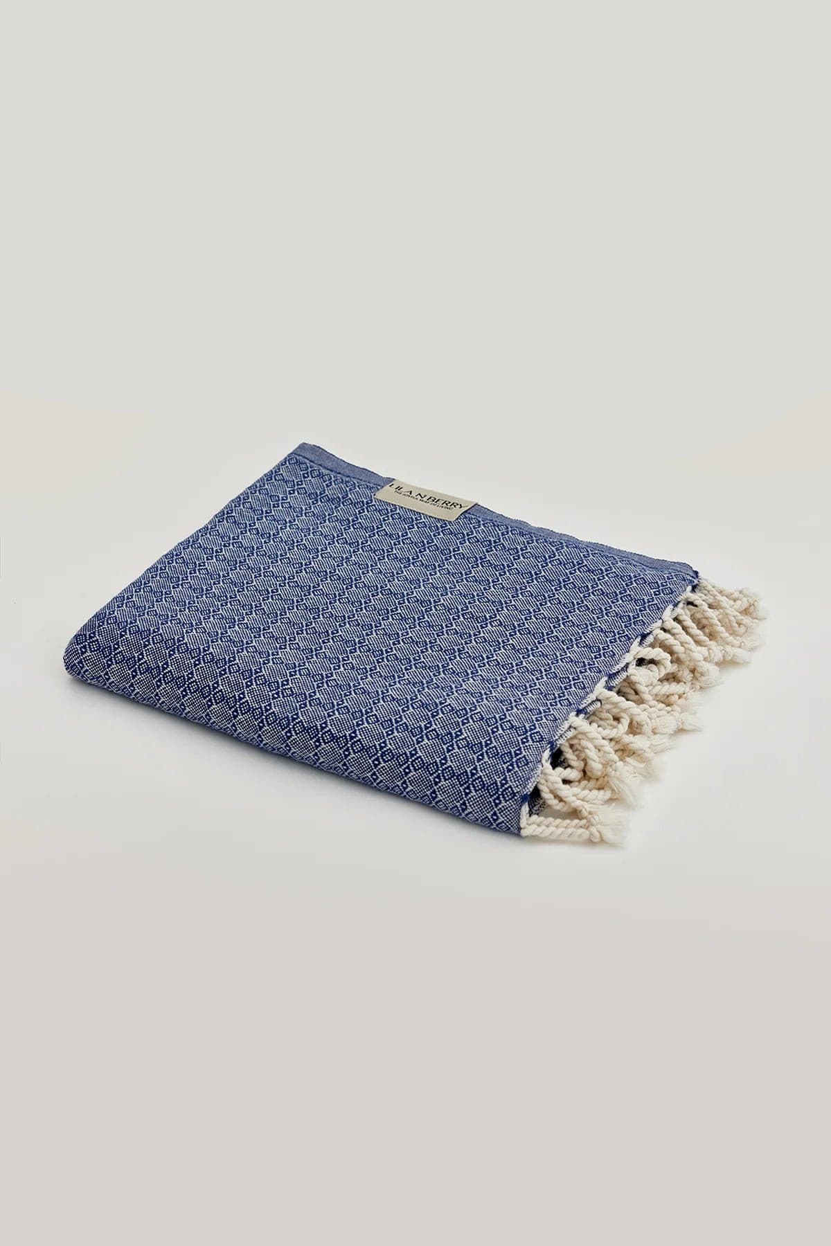 Alcazar Turkish towel in Indigo – Neatly folded towel, compact and ready for use