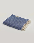 Alcazar Turkish towel in Indigo – Neatly folded towel, compact and ready for use