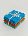 Comb Bundle – Folded bundle with multiple towels, tied with LILA N BERRY ribbon