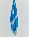 Comb Turkish towel in Marine – Full-length hanging view showcasing entire pattern and texture
