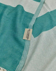 Comb Turkish towel in Sage – Close-up draped towel showing detail and texture