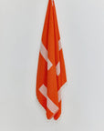 Comb Turkish towel in Sicilian Orange – Full-length hanging view showcasing entire pattern and texture