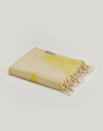 Fiori Turkish towel in Mellow Yellow – Neatly folded towel, compact and ready for use