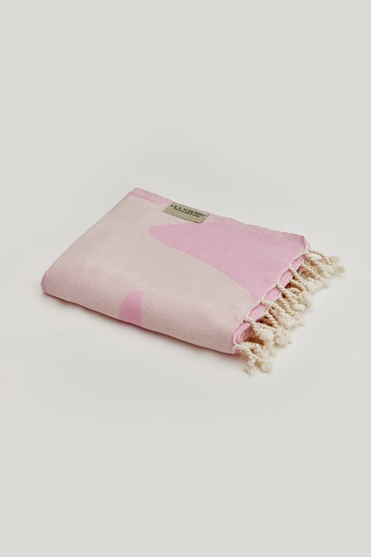Fiori Turkish towel in Pink Blush – Neatly folded towel, compact and ready for use