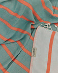 Lane Turkish towel in Peach Cream – Close-up draped towel showing detail and texture