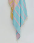 Lane Turkish towel in Pink Blue – Close-up hanging towel highlighting weave and softness