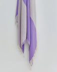 La Luna Turkish towel in Lilac – Close-up hanging towel highlighting weave and softness