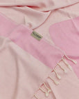 La Luna Turkish towel in Pink Blush – Close-up draped towel showing detail and texture