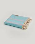 Lane Turkish towel in Pink Blue – Neatly folded towel, compact and ready for use