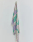 Pale Pluie Turkish towel in Mellow Green – Full-length hanging view showcasing entire pattern and texture