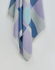 Pale Pluie Turkish towel in Mellow Indigo – Close-up hanging towel highlighting weave and softness