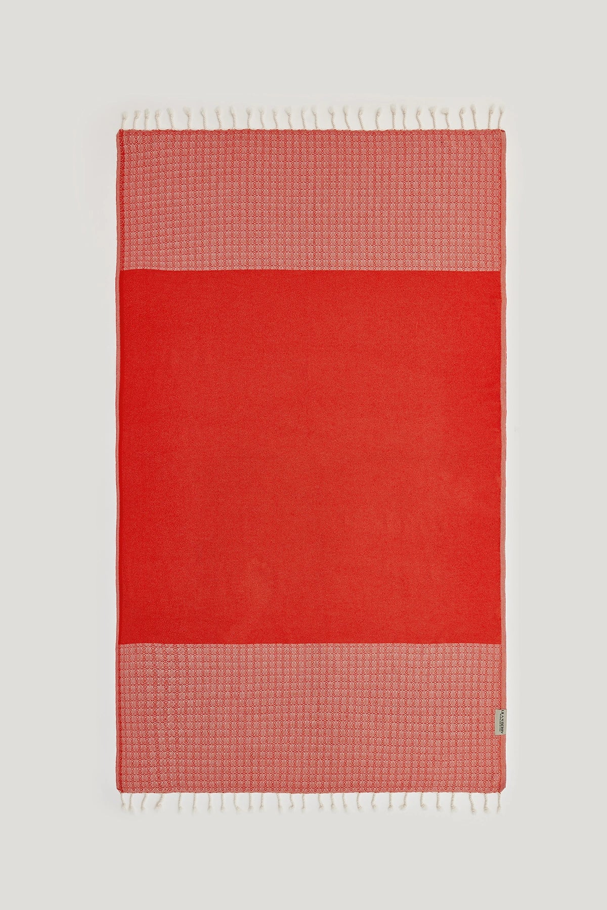 Alcazar Turkish towel in Red Charm – Flat lay front side with visible pattern