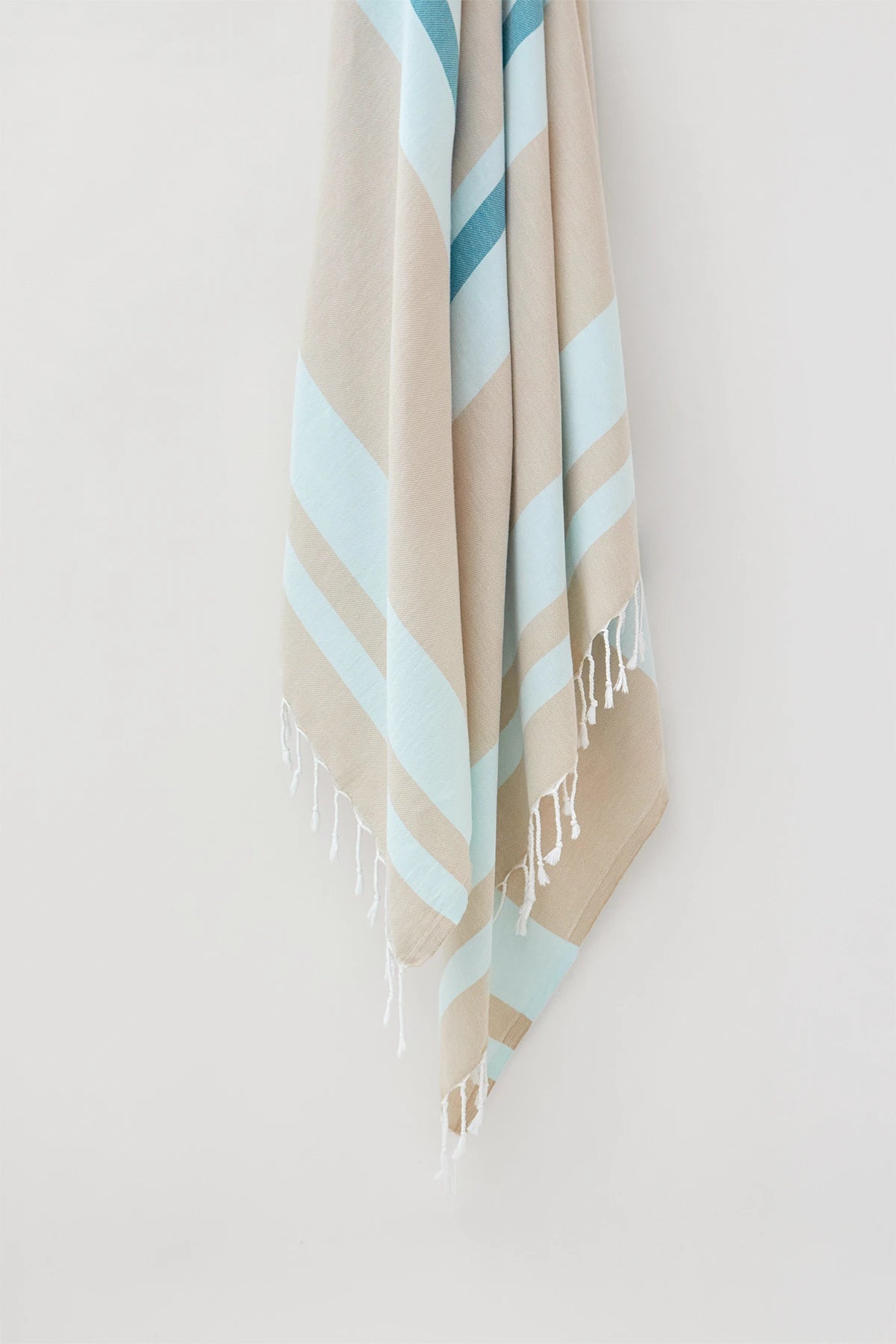 Bebe Sky Blue X-Large Turkish towel in Sky Blue – Close-up hanging towel highlighting weave and softness