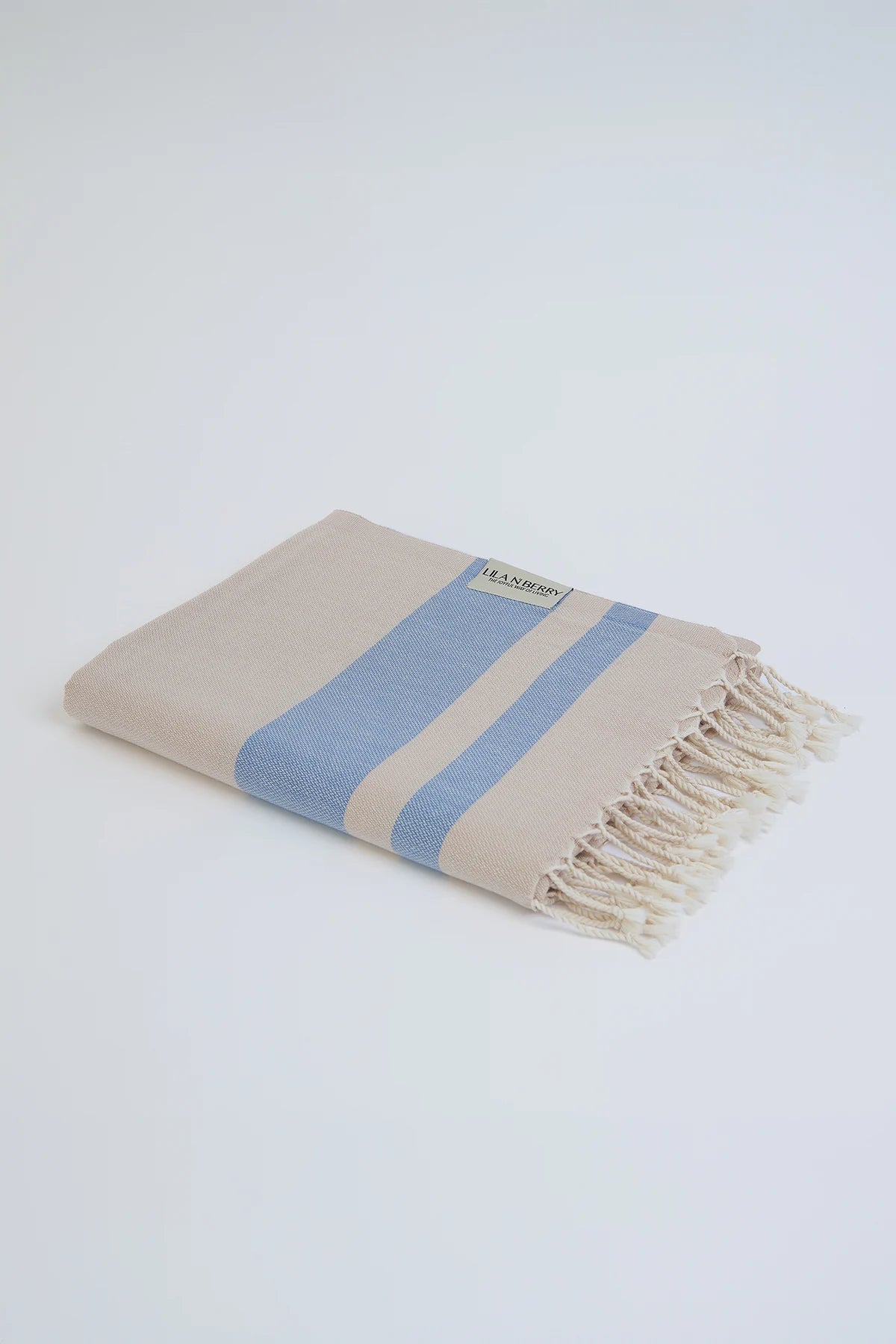 Bebe Turkish towel in Indigo – Neatly folded towel, compact and ready for use