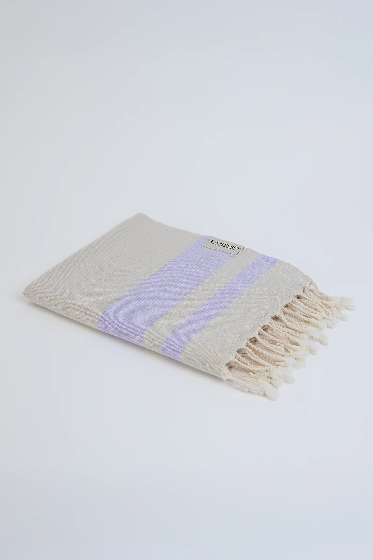 Bebe Turkish towel in Lilac – Neatly folded towel, compact and ready for use
