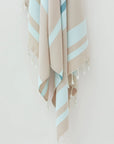 Bebe Turkish towel in Sky Blue – Close-up hanging towel highlighting weave and softness