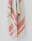 Bebe Turkish towel in Terra – Close-up hanging towel highlighting weave and softness