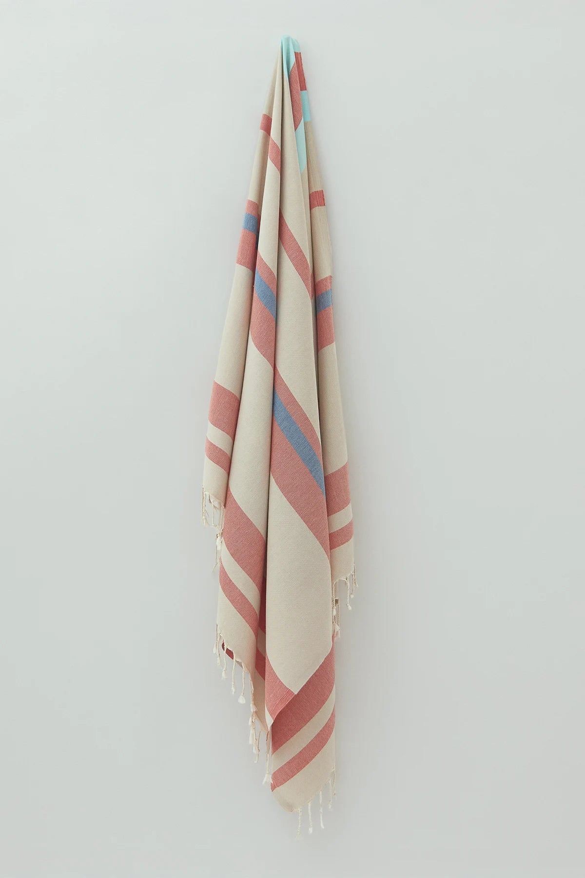 Bebe Turkish towel in Terra – Full-length hanging view showcasing entire pattern and texture