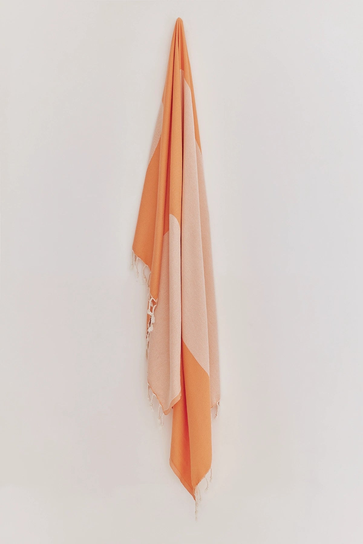 La Luna Turkish towel in Peach – Full-length hanging view showcasing entire pattern and texture