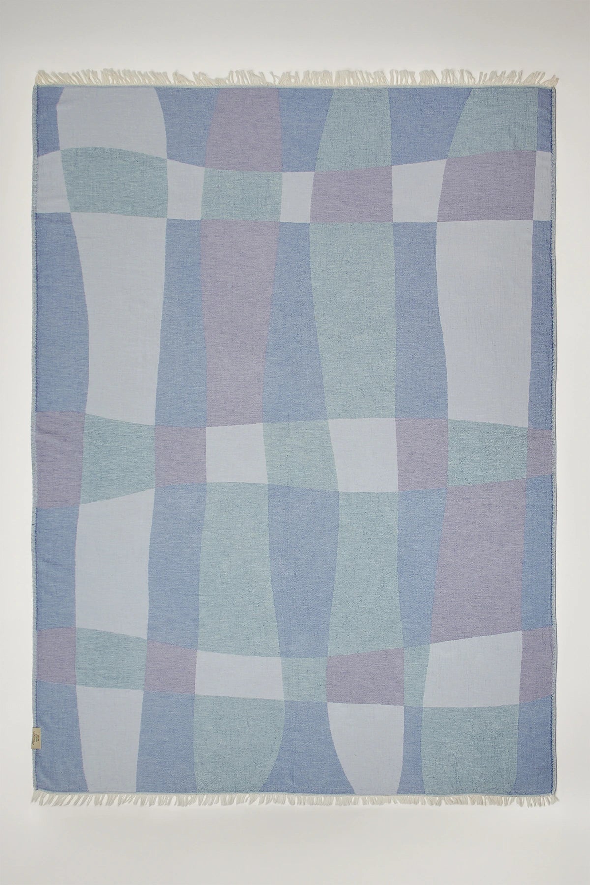 Pale Pluie Indigo X-Large Turkish towel in Mellow Indigo – Flat lay back side showing reverse weave