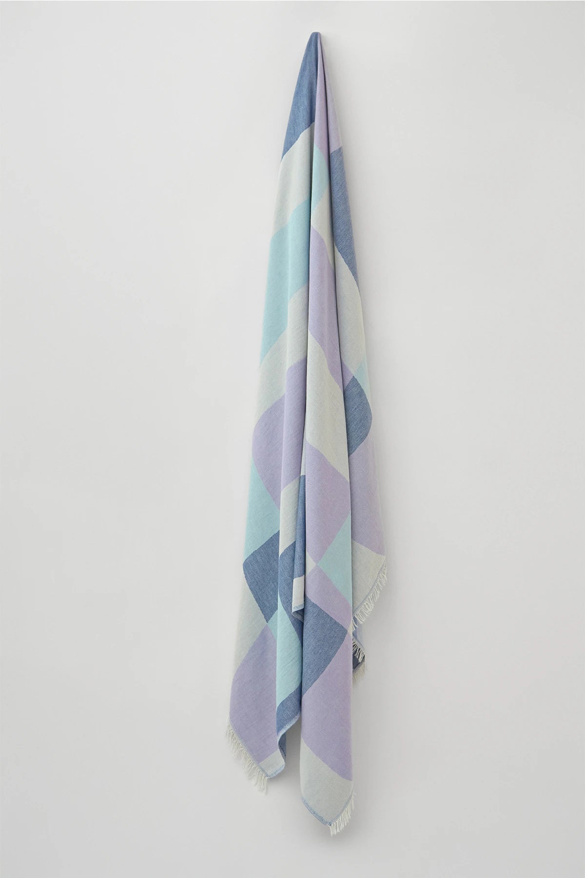 Pale Pluie Indigo X-Large Turkish towel in Mellow Indigo – Full-length hanging view showcasing entire pattern and texture