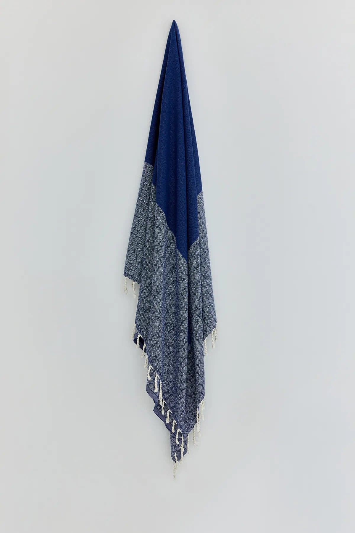 Alcazar Turkish towel in Indigo – Full-length hanging view showcasing entire pattern and texture