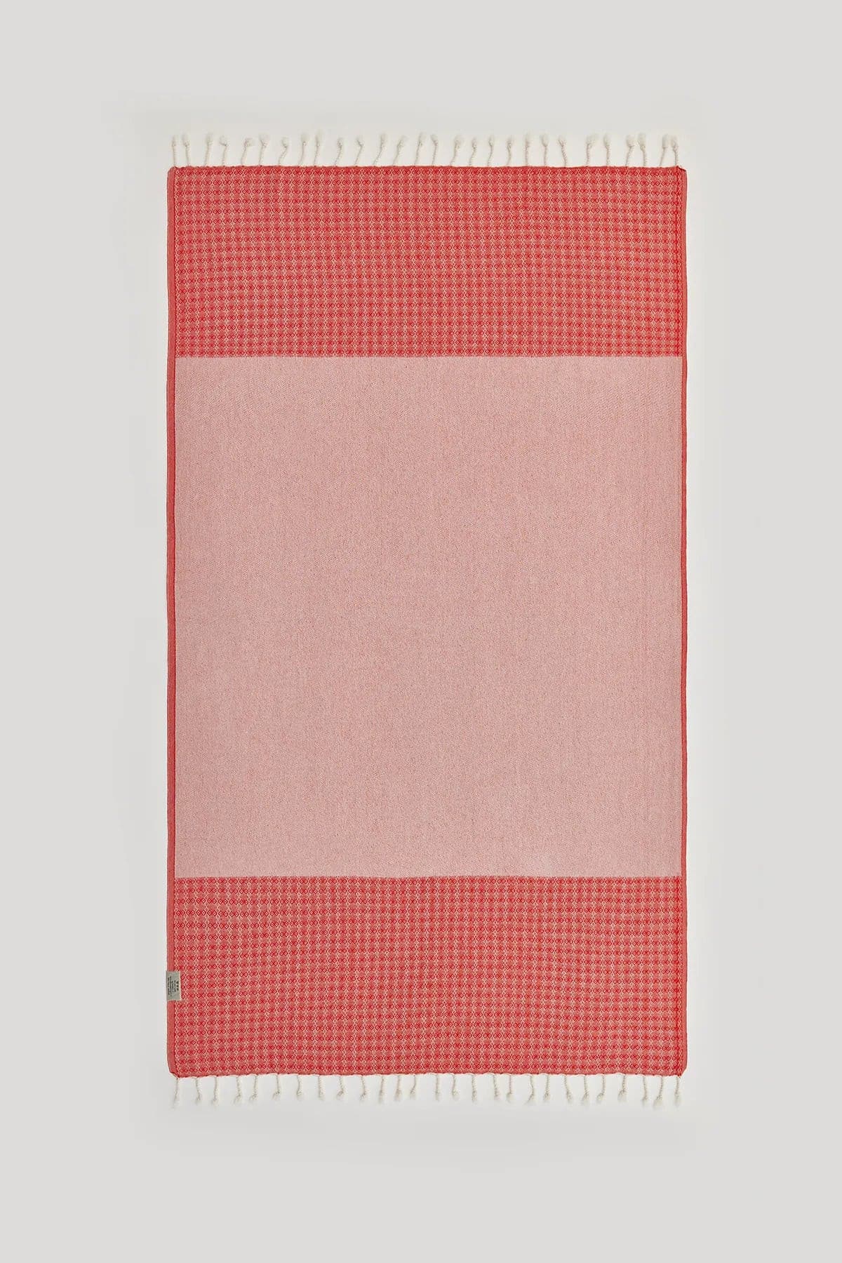 Alcazar Turkish towel in Red Charm – Flat lay back side showing reverse weave