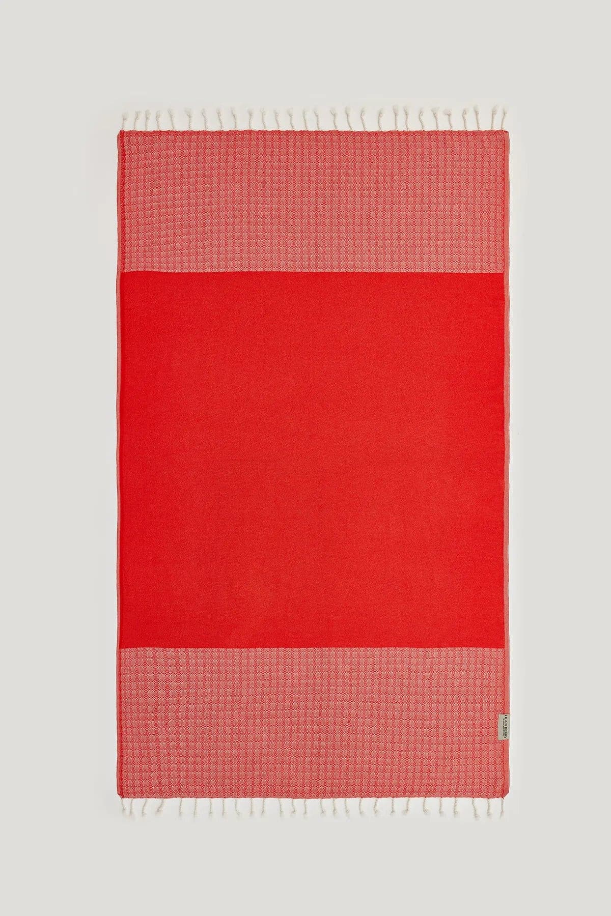 Alcazar Turkish towel in Red Charm – Flat lay front side with visible pattern