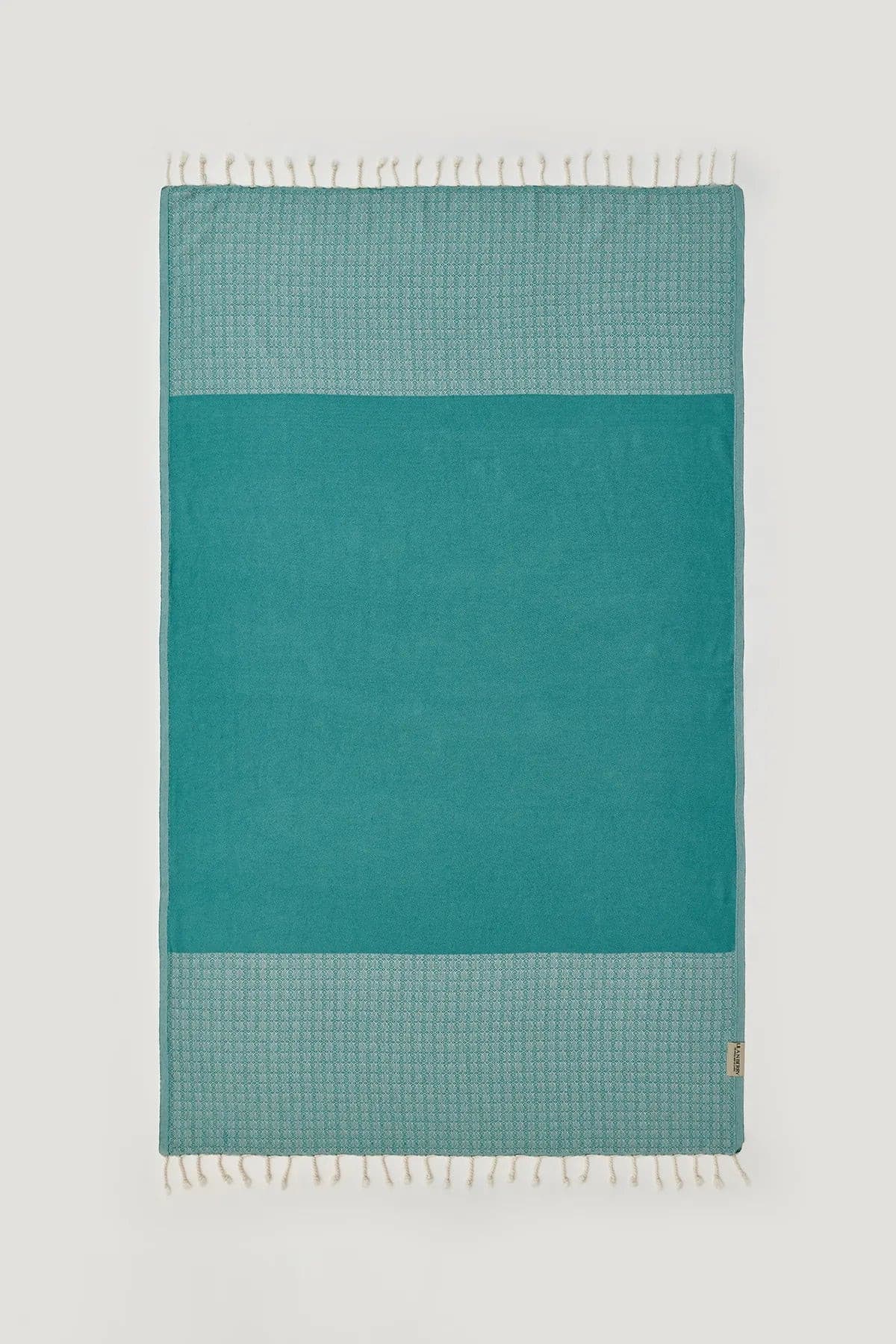 Alcazar Turkish towel in Sage – Flat lay front side with visible pattern