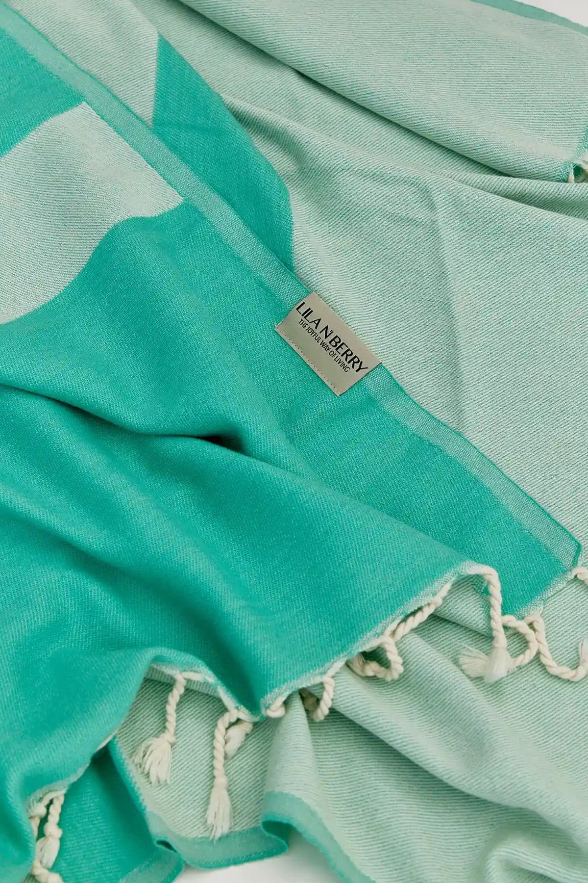Comb Turkish towel in Crystal Green – Close-up draped towel showing detail and texture