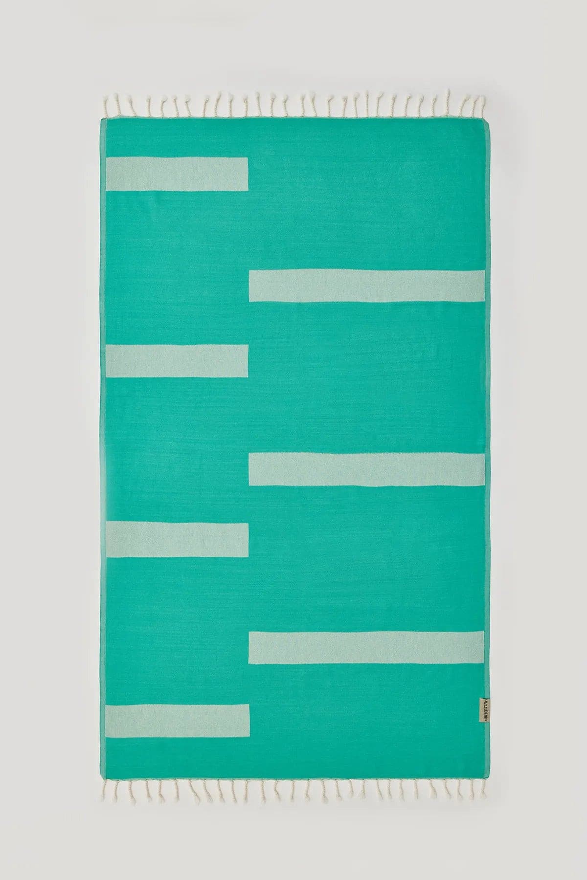Comb Turkish towel in Crystal Green – Flat lay front side with visible pattern