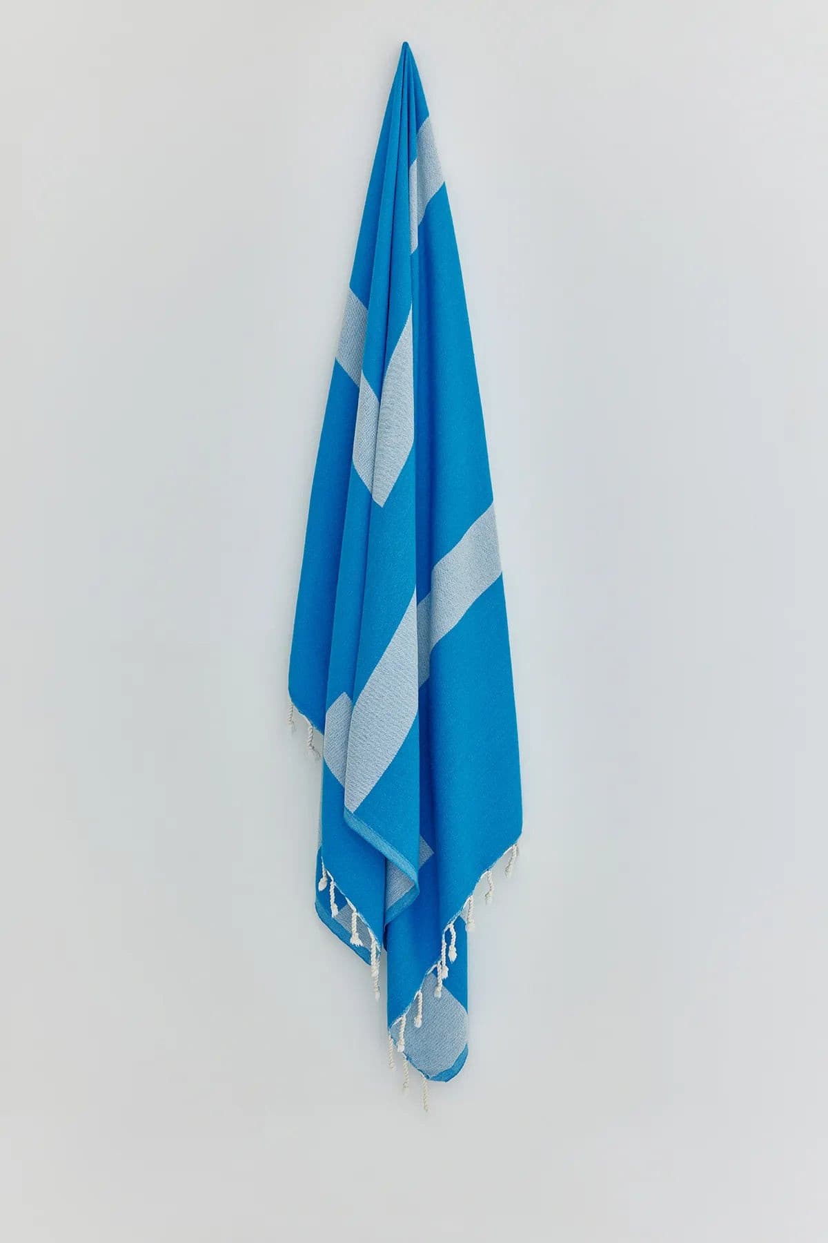 Comb Turkish towel in Marine – Full-length hanging view showcasing entire pattern and texture