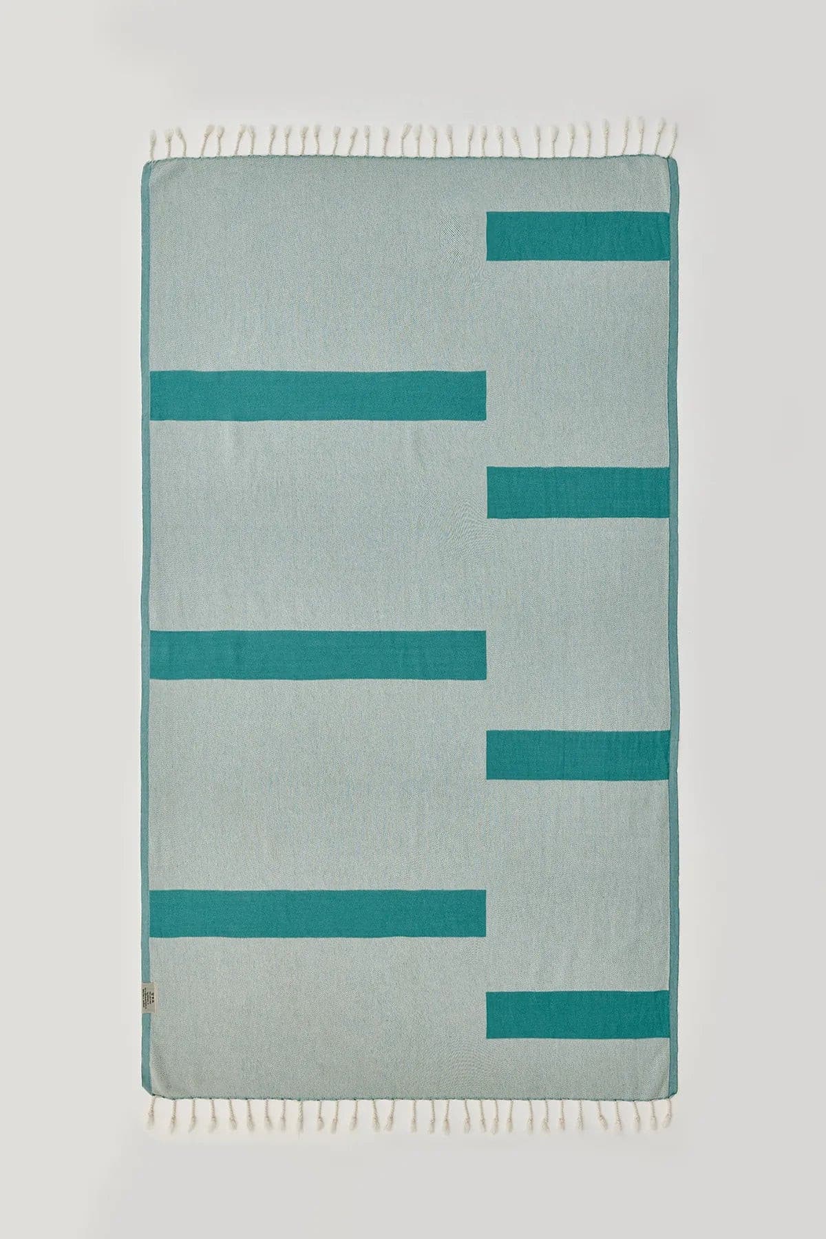 Comb Turkish towel in Sage – Flat lay back side showing reverse weave