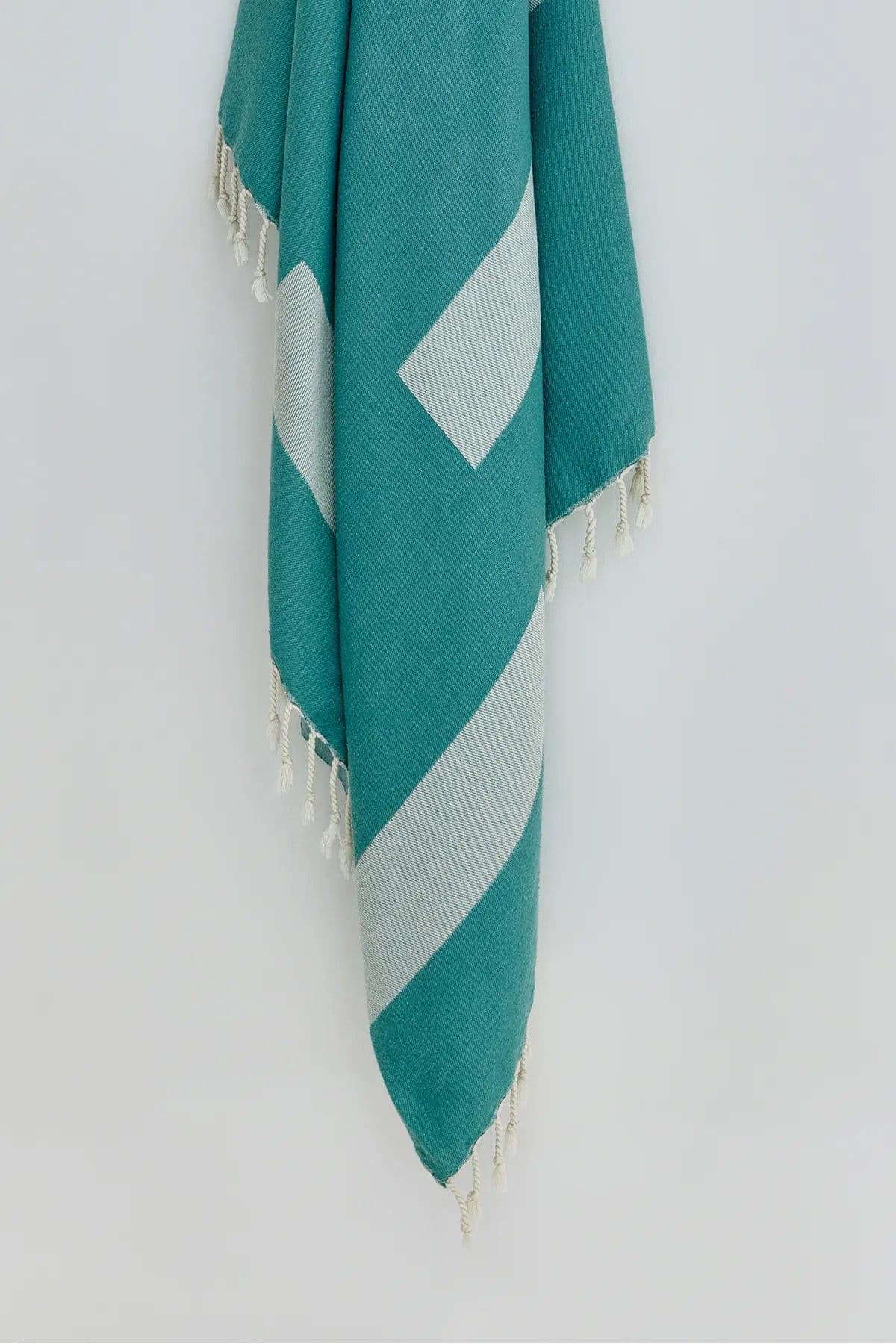 Comb Turkish towel in Sage – Close-up hanging towel highlighting weave and softness