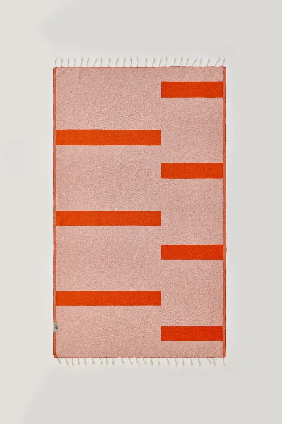 Comb Turkish towel in Sicilian Orange – Flat lay back side showing reverse weave