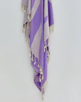 Fiori Turkish towel in Lilac – Close-up hanging towel highlighting weave and softness