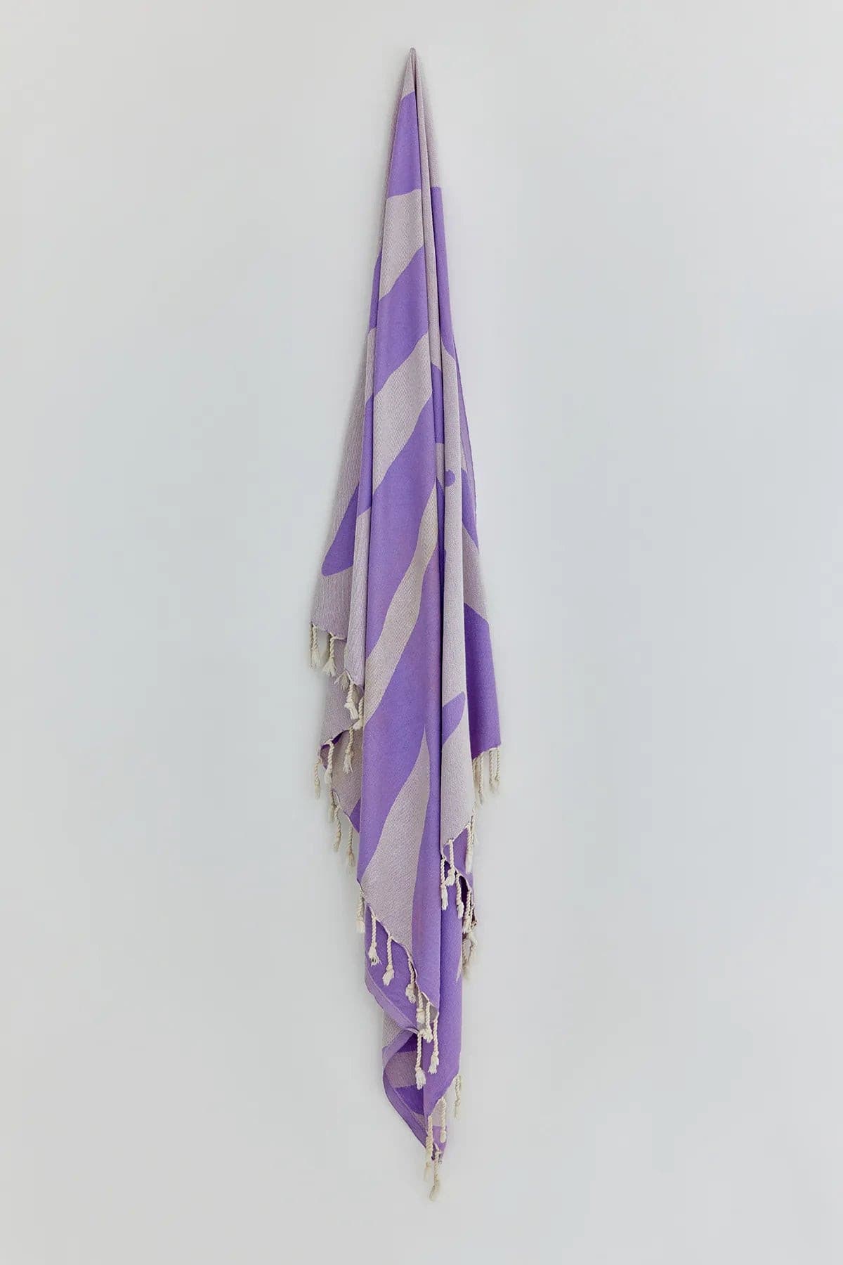 Fiori Turkish towel in Lilac – Full-length hanging view showcasing entire pattern and texture
