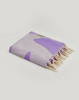 Fiori Turkish towel in Lilac – Neatly folded towel, compact and ready for use