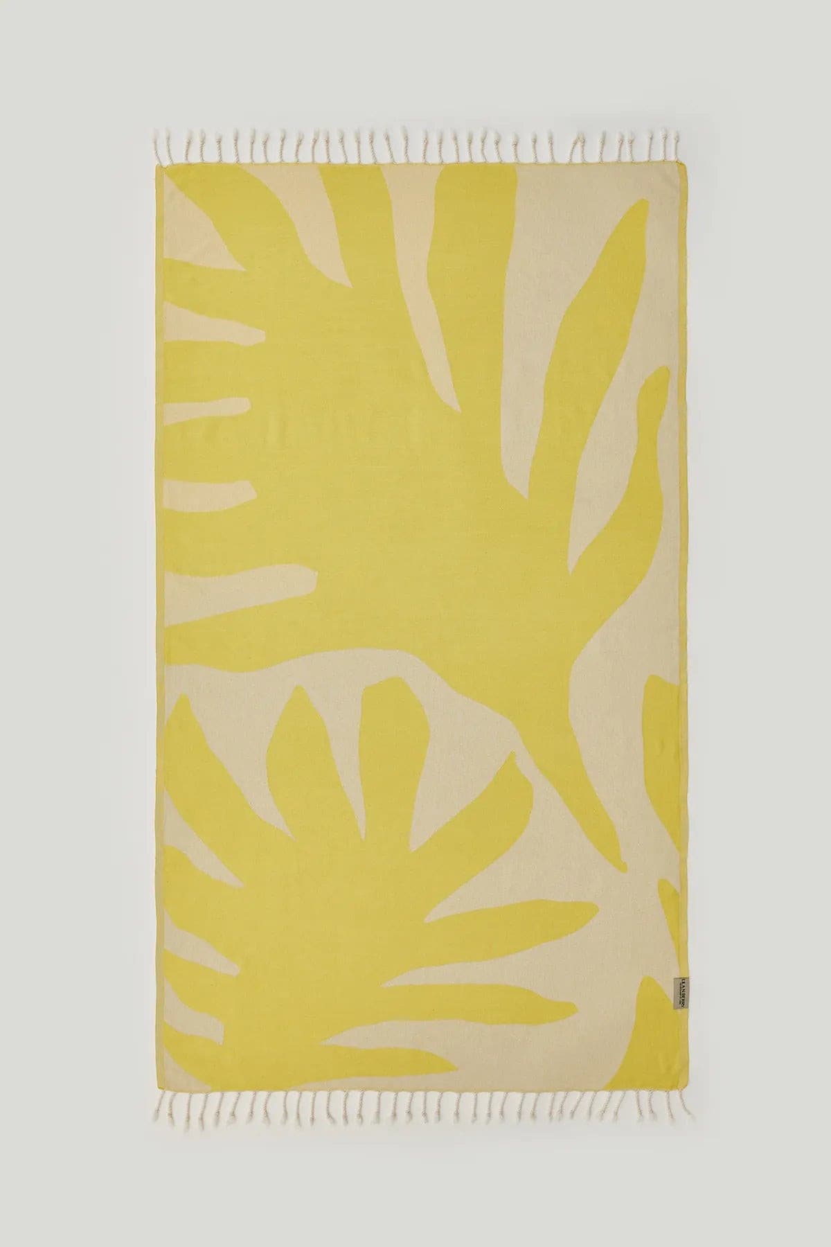 Fiori Turkish towel in Mellow Yellow – Flat lay front side with visible pattern