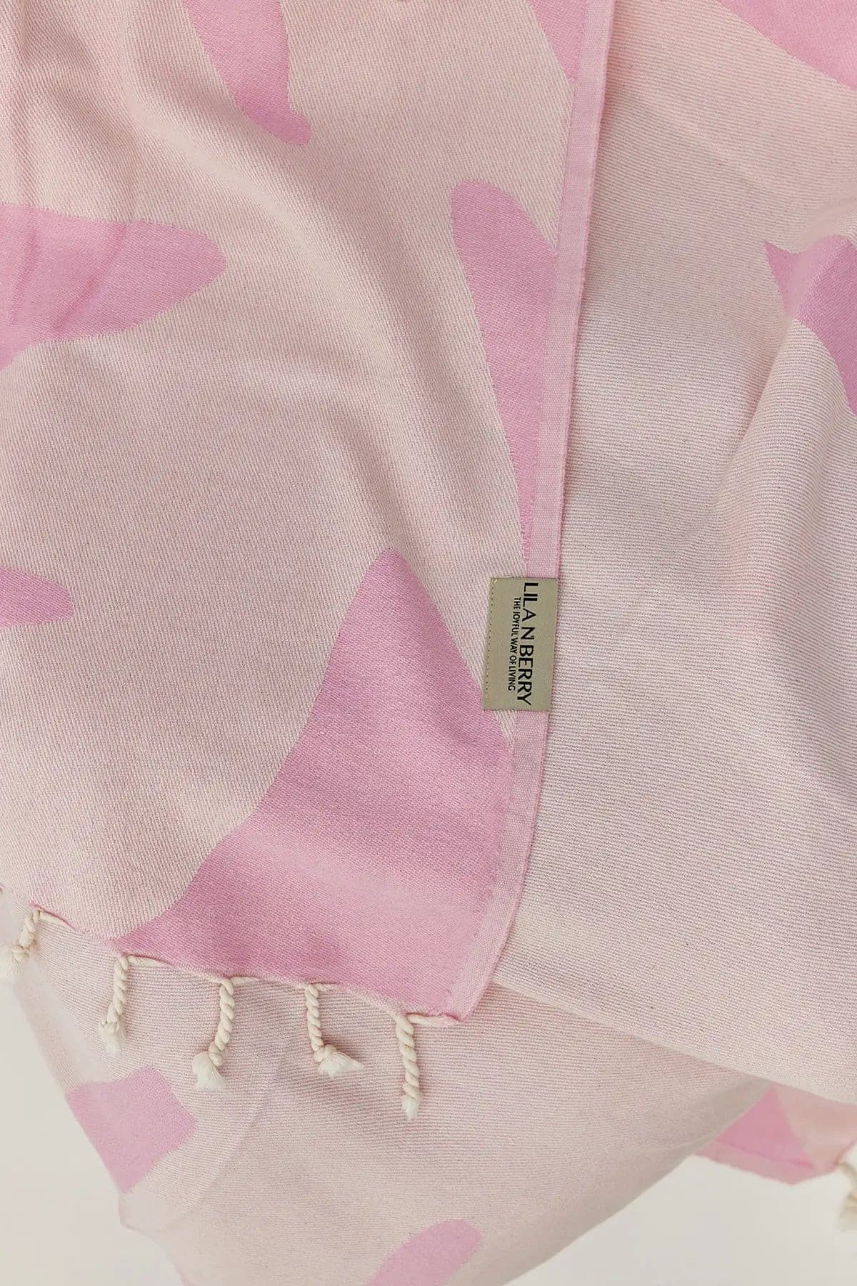 Fiori Turkish towel in Pink Blush – Close-up draped towel showing detail and texture