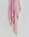 Fiori Turkish towel in Pink Blush – Close-up hanging towel highlighting weave and softness