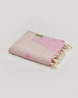 Fiori Turkish towel in Pink Blush – Neatly folded towel, compact and ready for use