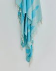Fiori Turkish towel in Sky Blue – Close-up hanging towel highlighting weave and softness