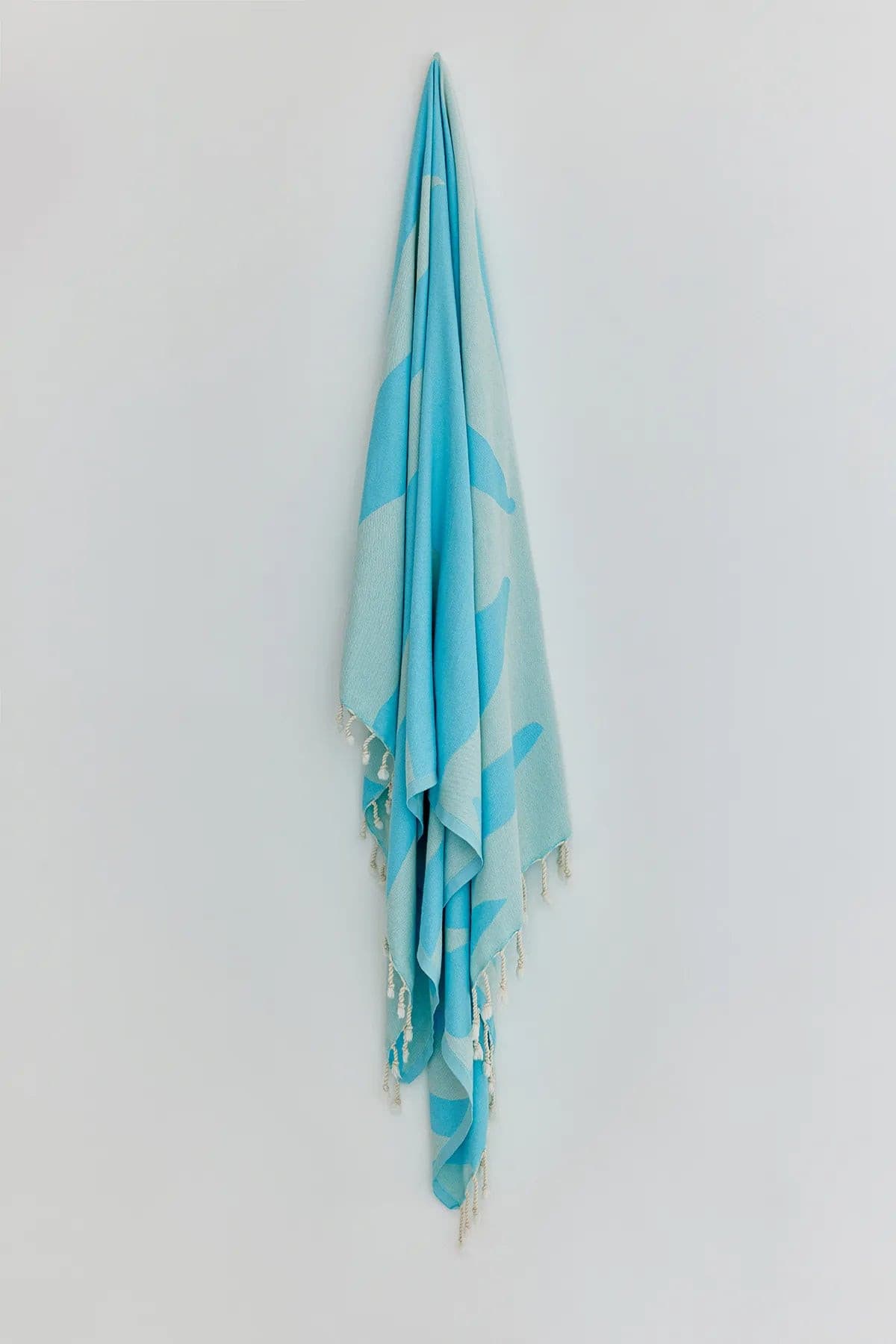 Fiori Turkish towel in Sky Blue – Full-length hanging view showcasing entire pattern and texture