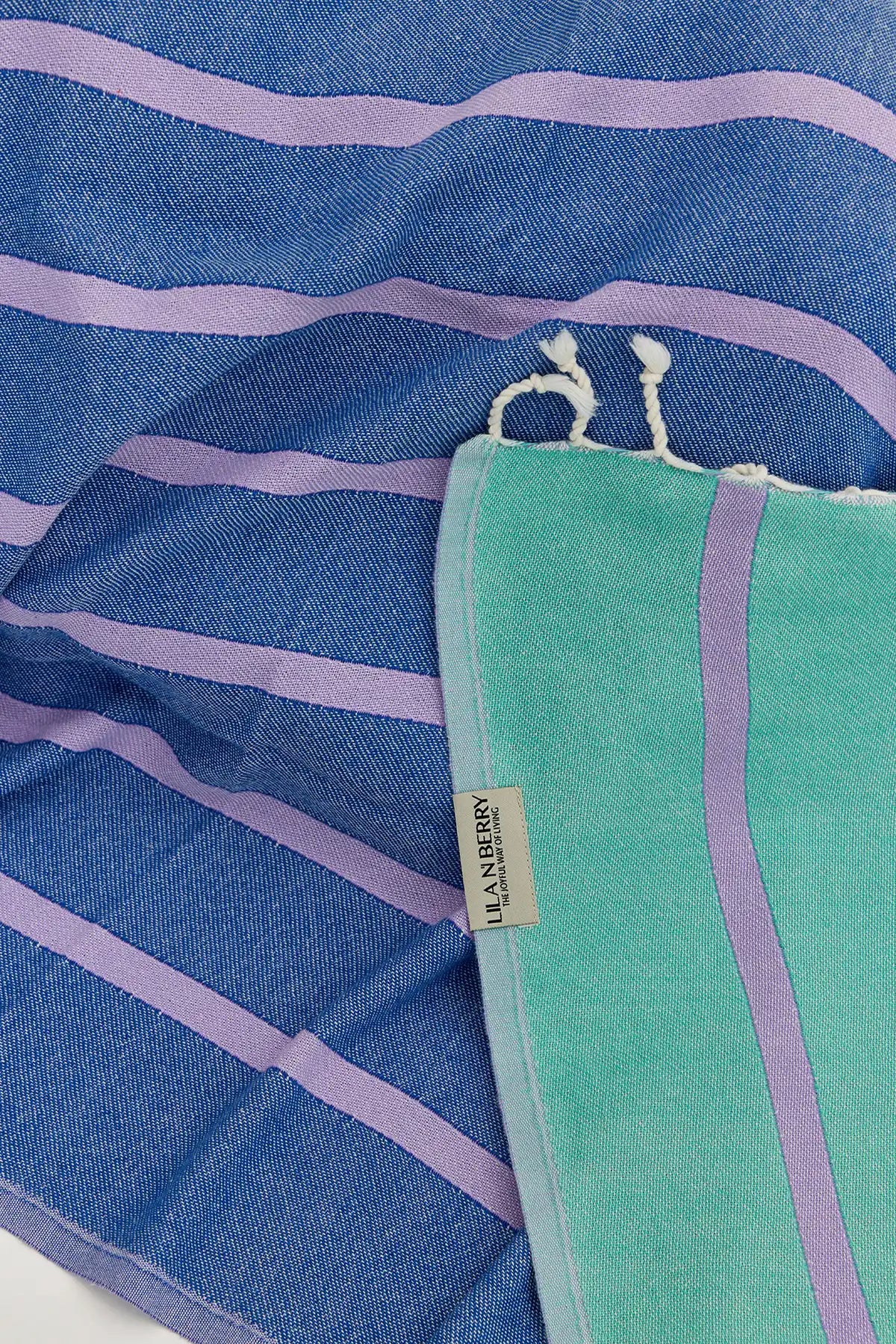 Lane Turkish towel in Lilac Green – Close-up draped towel showing detail and texture